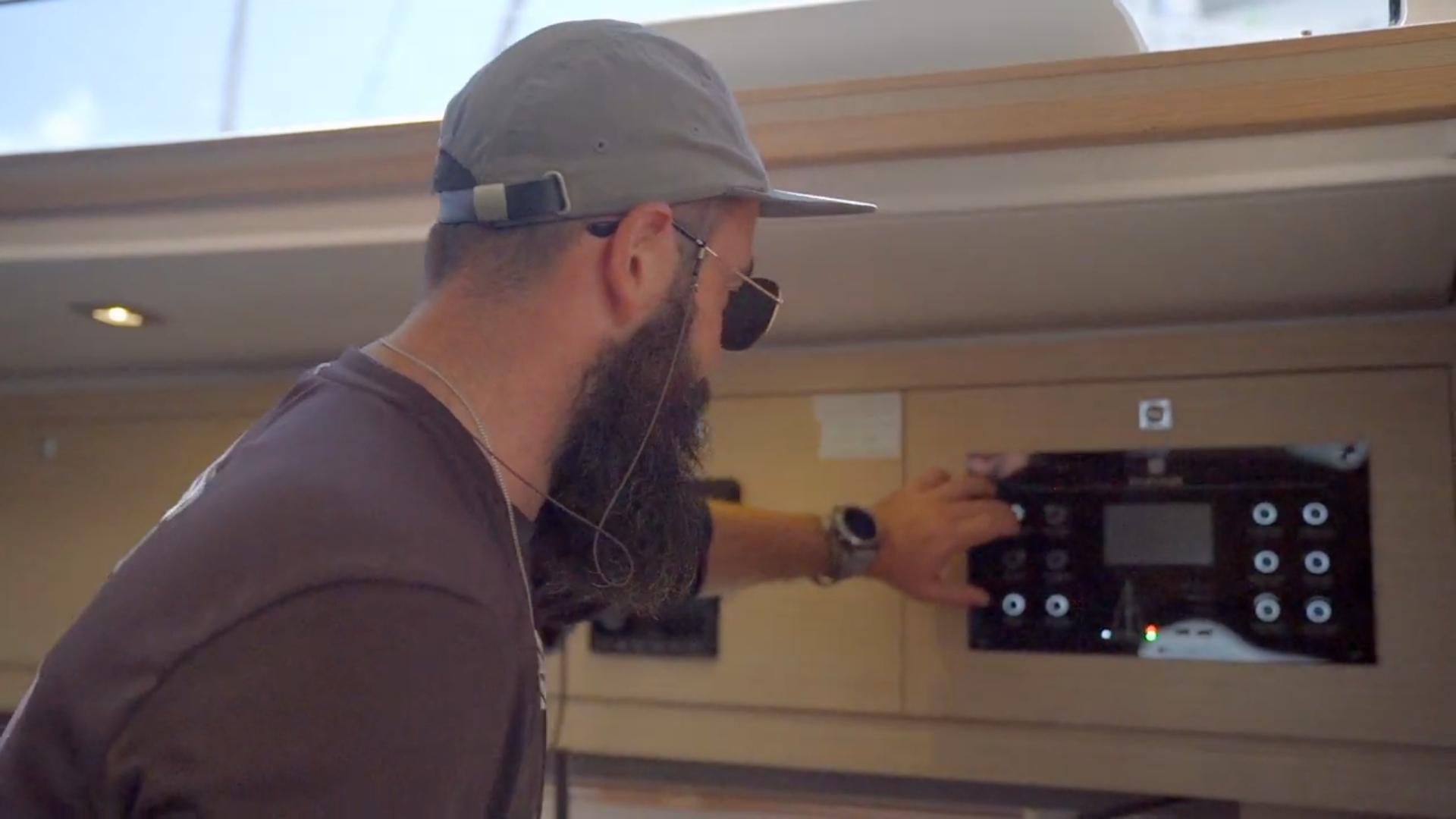Images of Tony turning off yacht instruments